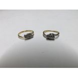 Two early/Mid-20th Century 18ct Gold and Platinum Engagement Rings of cross over design, each set