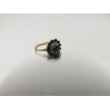 Unmarked precious metal all small dark blue Sapphire and small Diamonds, circular cluster Ring