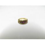 Edwardian hallmarked 18ct Gold Ring, oval panel set with three red stones and two small Diamonds,