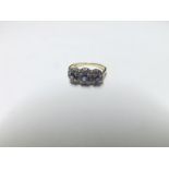 High grade precious metal small Diamonds and Sapphires triple cluster Ring, stamped "18ct"