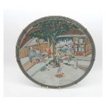 A Chinese Circular Plate depicting a sleeping master and his apprentices, within a geometric border,