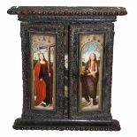 EARLY 20TH CENTURY STAINED WOOD TRIPTYCH DECORATED WITH PRINTED RELIGIOUS AND HERALDIC PANELS