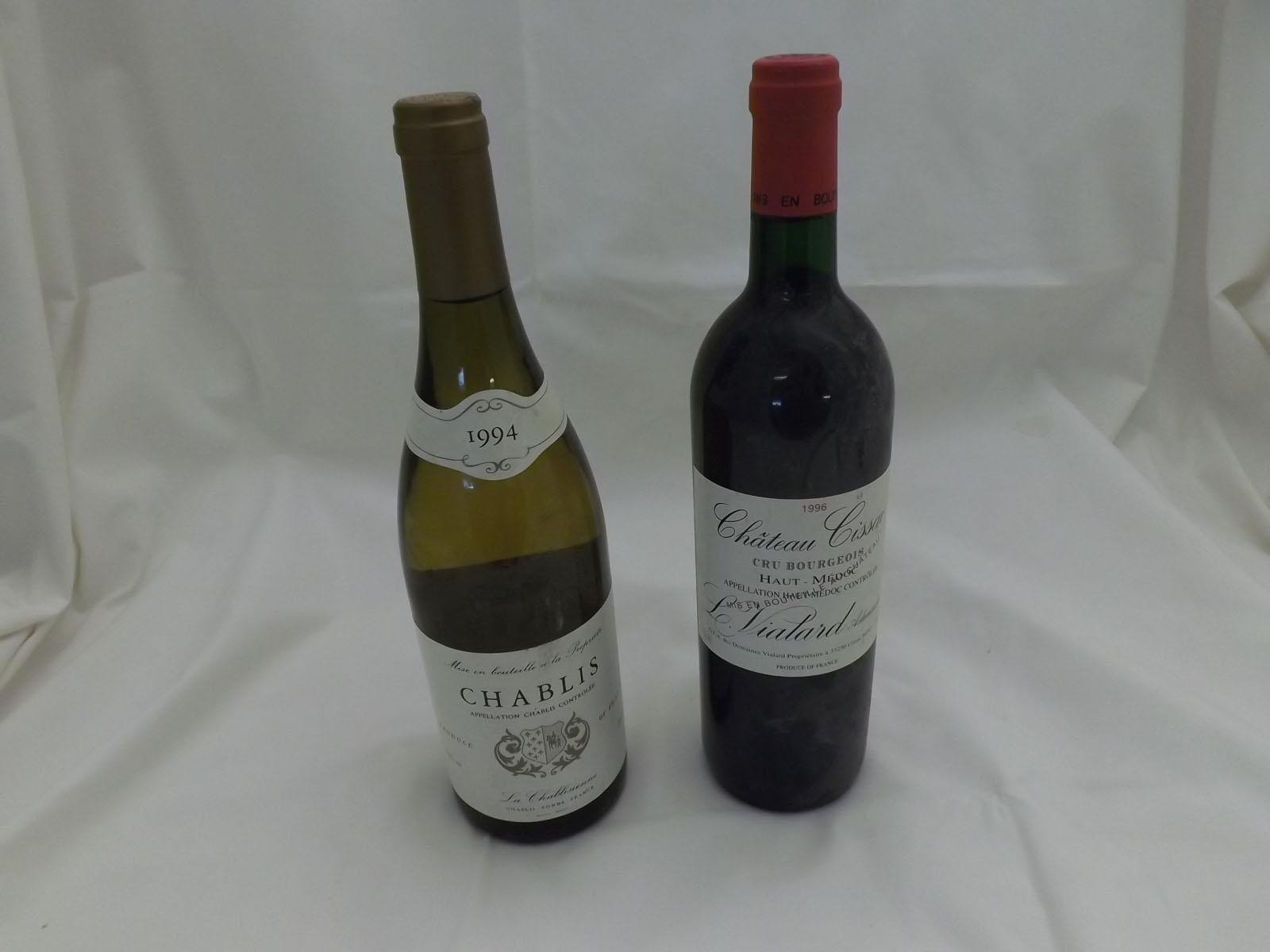 Two bottles comprising Chablis 1994 and 1 bottle Ch Cissac Cru Bourgeois haute Medoc 1996