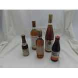 Five bottles including La Flora Blanche Muscat Beaunes de Venise 1987, half bottle of Ch Loupiac