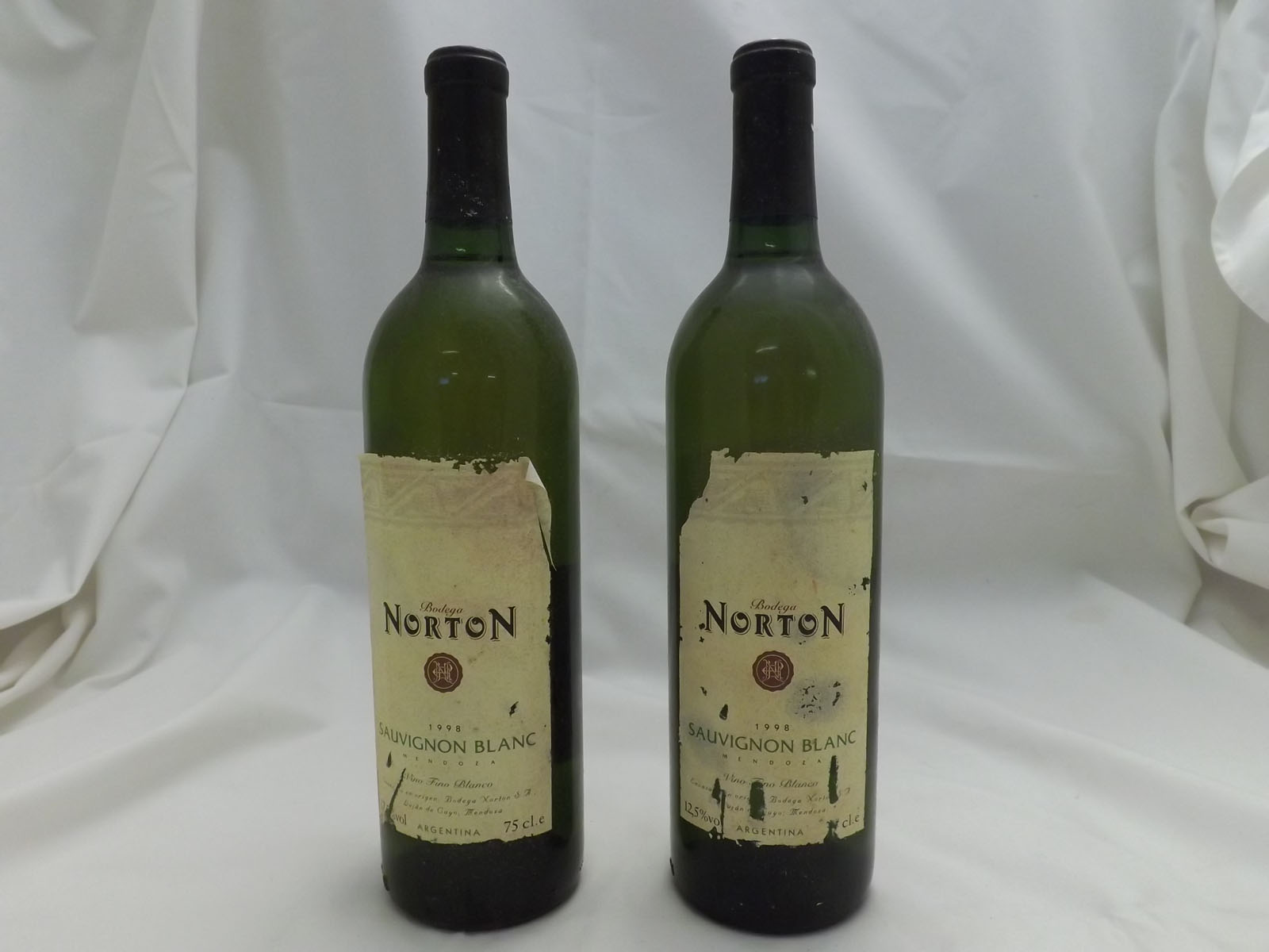 Nine bottles comprising 7 x Ch Norton Sauvignon Blanc 1998, 2 x Ch Bolcetto D?Alba Voerzio 2002