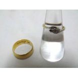 Mixed lot comprising a hallmarked 22ct Gold Wedding Band, hallmarked for Birmingham 1910, weighing