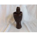 An unusual Ethnic style Pestle and Mortar carved with motif of a Rhino, 7" high