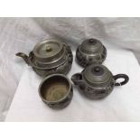 Oriental Pewter tea service comprising Tea Pot, Hot Water Jug, covered Sugar Bowl and further