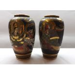 A pair of 20th Century Satsuma Baluster Vases of tapering form, decorated in typical manner with