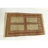 A Caucasian Wool Runner, large central square panels decorated with geometric designs within a