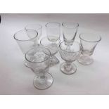 Group of eight assorted 19th Century clear glass Rummers to include examples with fluted bowls,