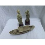 Two Oriental Soapstone Figures and a further Model of a Riverboat (3)