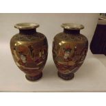 A pair of 20th Century Large Satsuma Baluster Vases, typically decorated in heavy palette with