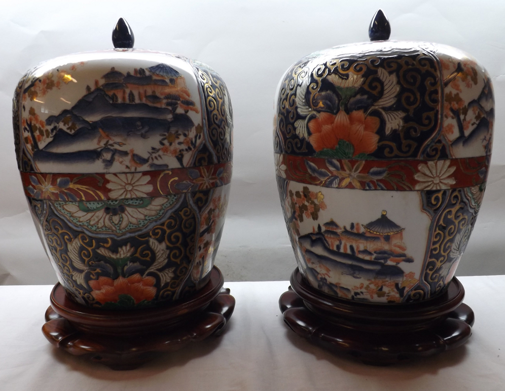 A pair of good quality 20th Century Chinese Large Covered Balustered Vases of tapering form, each