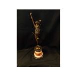 Bronze statuette of a dancer, raised on a black and veined coloured marble socle, the base also with