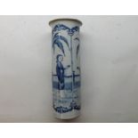 A Chinese Cylinder Vase with flared rim, decorated in underglaze blue with compartmentalised