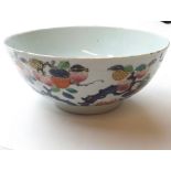 A Chinese Export Circular Bowl, the outer body decorated in underglaze blue and famille rose etc