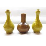 A pair of Oriental Yellow Crackle Glaze Balustered Spill Vases, together with a further Brown