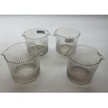Set of four 19th Century clear wine glass coolers of circular form, bodies decorated with ribbed