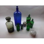 Mixed lot of seven assorted coloured chemists bottles of varying designs, together with Burgess s