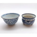 20th Century Chinese blue and white small bowl decorated with stylised foliage, together with a