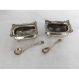 A pair of Edward VII Silver Four Footed Salts and accompanying Spoons, hallmarked Birmingham 1907,