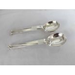 A Mixed Lot comprising: two pair of Arts & Crafts style Silver Tablespoons, bearing Sheffield and