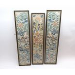 Three framed late 19th or early 20th Century needlework mandarin-type sleeves, decorated with