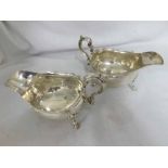 A good pair of George V Silver Sauce Boats in the 18th Century manner, fitted with scrolled handles,