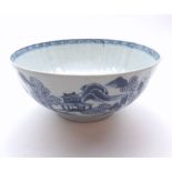 18th Century Chinese blue and white pedestal bowl, decorated with river scenes, raised on a short