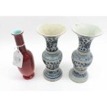 A pair of small Chinese Baluster Vases, each with 6 character marks and decorated in underglaze blue