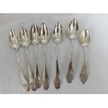 A Mixed Lot comprising: a set of six Austro-Hungarian white metal Dessert Spoons, plus one other,