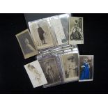 Album containing 50+ postcards and photos, music hall and variety act artistes, qty sigd including