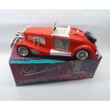 A Steepletone "Red Lady" Novelty Car Alarm Clock, modelled as a 1940s Open Topped Car "Red Lady" (