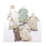 A collection of five assorted Bisque Bonnet Head Dolls   30-40