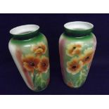 A pair of French Glass Baluster Vases, decorated in colours with sunflowers on a predominantly