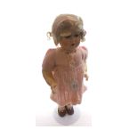 A mid-20th Century all composition socket head doll, with weighted blue sleep glass eyes, painted