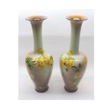 A pair of Royal Doulton Faience Balustered Spill Vases of tapering conical form, decorated with