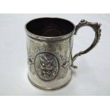 Victorian Silver Christening Tankard of slightly tapering cylindrical form, embossed with cartouches