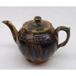 19th Century Whieldon style slipware Tea Pot decorated in browns and greens on a beige background,