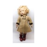 A Chad Valley felt and cloth bodied doll, formed as a little girl with blonde curly hair, height 18"