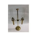 Unusual Brass framed adjustable double library candle stand, fitted with clear glass chimneys,