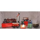 A small collection of Hornby "O" Gauge to include Clockwork No 2 LMS Tank Locomotive in burgundy