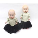 Two small composition Sister type Dolls, with painted features, height 8"