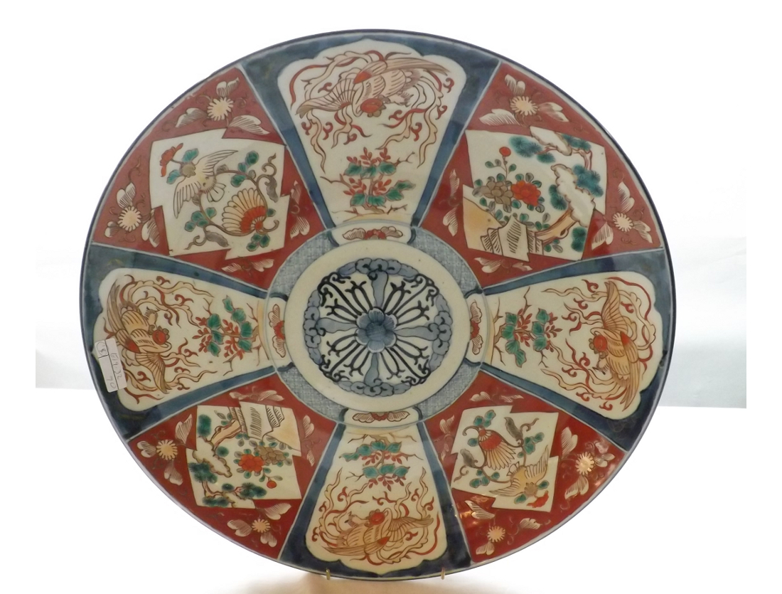 A Japanese Imari Large Charger, typically decorated in traditional colours with a radiating floral