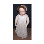 A Simon and Halbig Bisque Head Doll, features painted lashes and brows, eyes fixed (repainted/