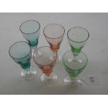 Set of six 20th Century small wines with coloured glass bowls with clear stems and bases, 4 1/2"