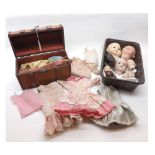A small collection of assorted Bisque and Composition Doll Heads, together with a small trunk