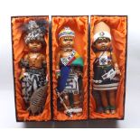 Three modern hand-made South African dolls in traditional costume, each within original box