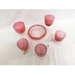 A small collection of Cranberry Glass: three Custard Cups, two Stemmed Wines and Shaped Bowl (6)